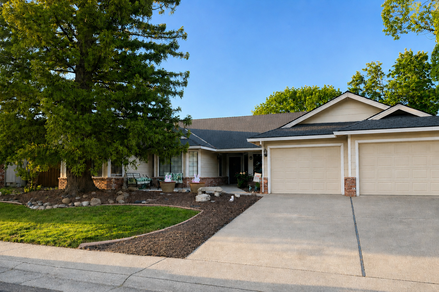 Exterior of the Rocklin furnished-living home, with a shaded front garden